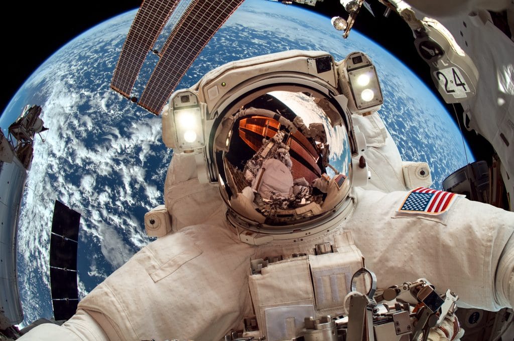 Astronaut undertaking space walk on the International Space Station