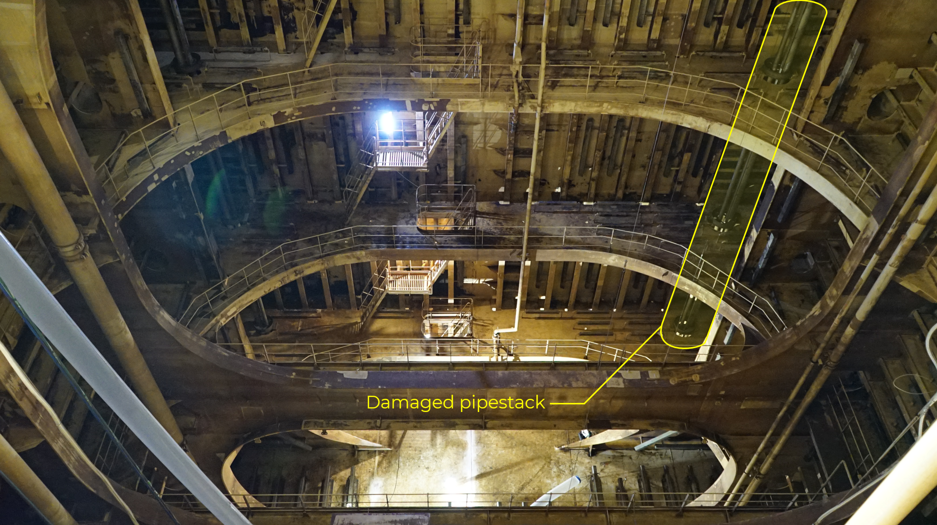 view of cargo tank with damaged pipestack identified 