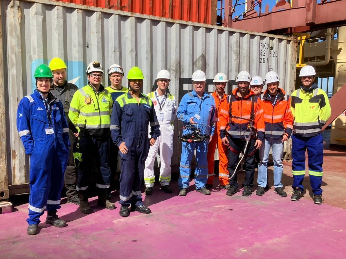 Group photo of Naval Architects with UAV and inspection equipment