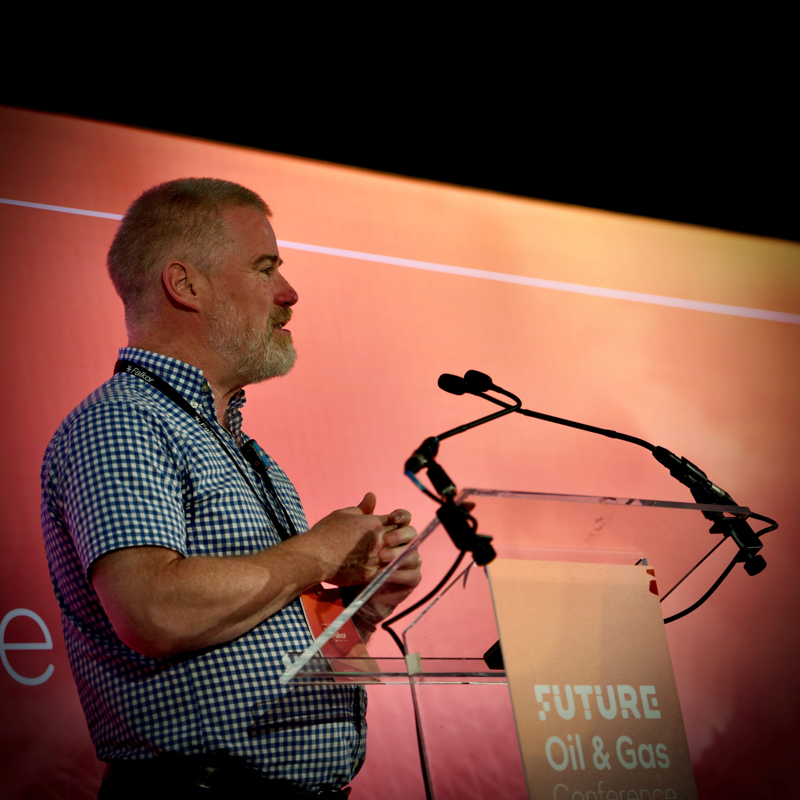 Professional photograph of a keynote speaker from the conference platform